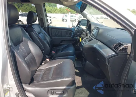 2010 Honda Odyssey Touring z USA, uszkodzony, nr VIN 5FNRL3H97AB013477